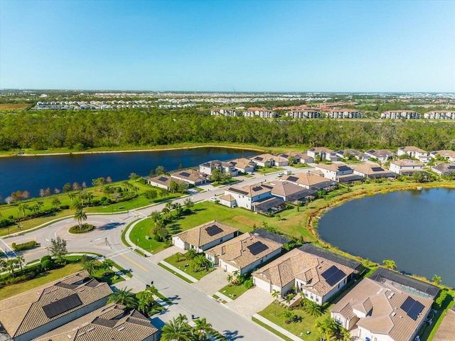 drone / aerial view with a water view