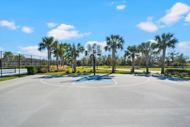 view of basketball court with tennis court