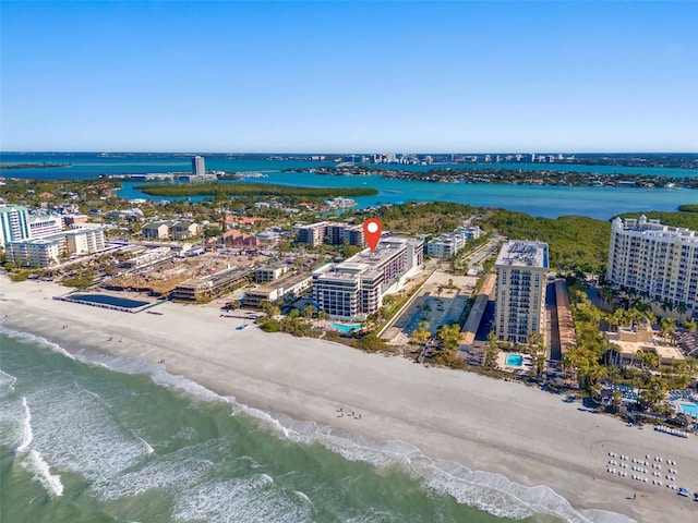 bird's eye view with a view of the beach and a water view