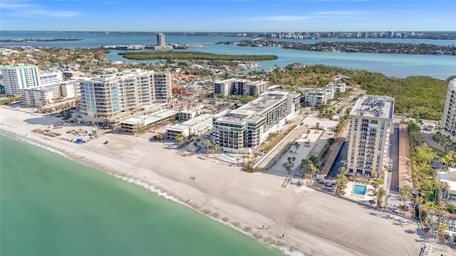 bird's eye view featuring a water view and a city view