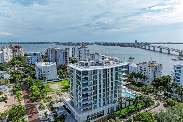 111 Golden Gate Pt Unit 402, Sarasota, FL 34236 - view of urban area featuring a notable bridge, apartment complex, and a nearby body of water