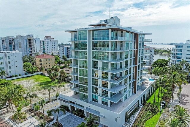 111 Golden Gate Pt Unit 402, Sarasota, FL 34236 - view of apartment building / complex with a view of city and a water view