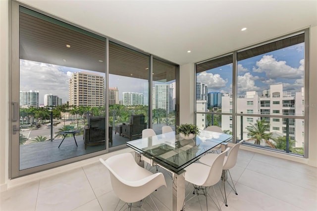 sunroom featuring a view of city