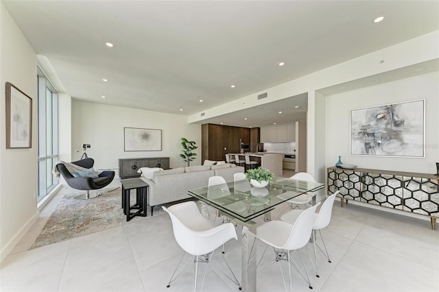 dining room with recessed lighting, visible vents, and light tile patterned flooring