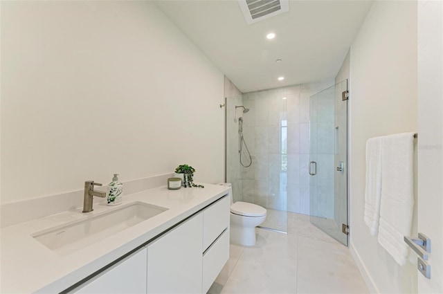 full bath featuring visible vents, toilet, tile patterned flooring, vanity, and a shower stall