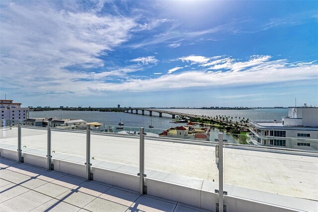 111 Golden Gate Pt Unit 402, Sarasota, FL 34236 - water view with a notable bridge