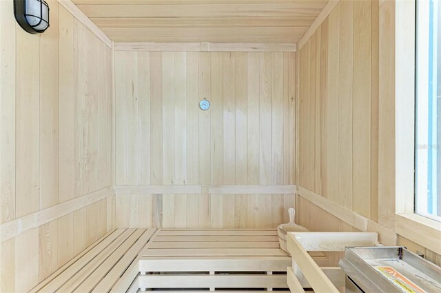 111 Golden Gate Pt Unit 402, Sarasota, FL 34236 - sauna with wooden walls and wooden ceiling