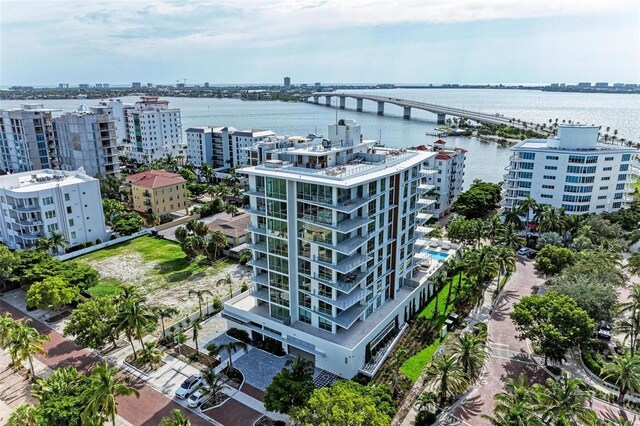 111 Golden Gate Pt Unit 402, Sarasota, FL 34236 - view of urban area featuring a notable bridge, apartment complex, and a large body of water