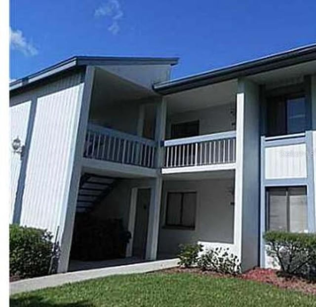 view of property exterior with a balcony