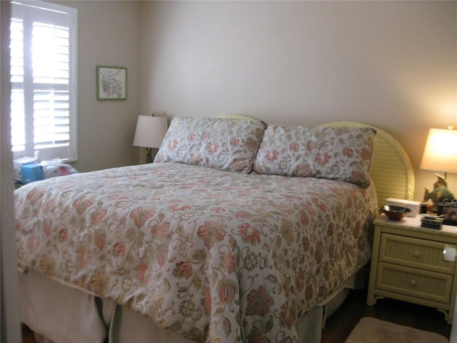 bedroom featuring multiple windows