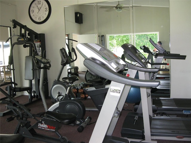 exercise room with ceiling fan