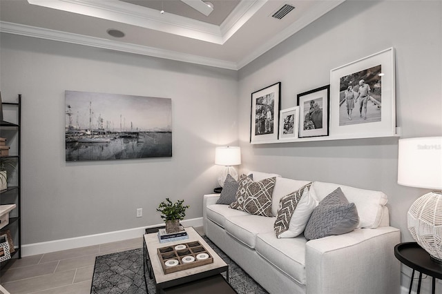 tiled living room with ornamental molding