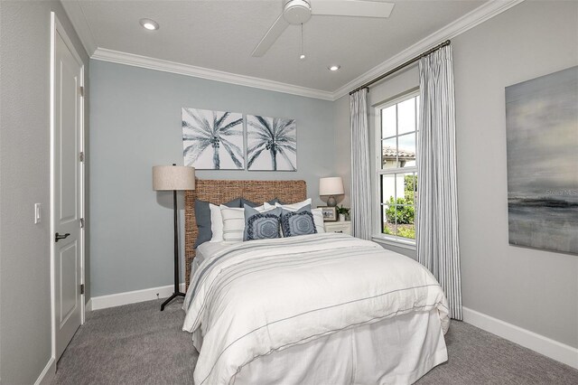 bedroom featuring carpet, ceiling fan, and ornamental molding