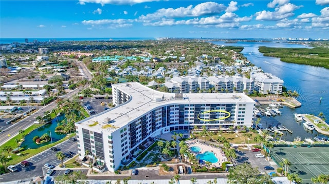 birds eye view of property with a water view