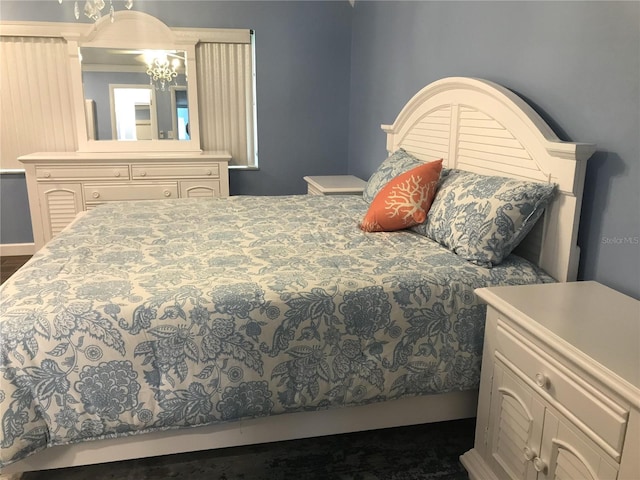 1446 56th St W Unit 1446, Bradenton, FL 34209 - bedroom featuring a chandelier