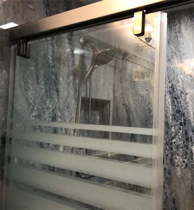 1446 56th St W Unit 1446, Bradenton, FL 34209 - bathroom featuring a marble finish shower