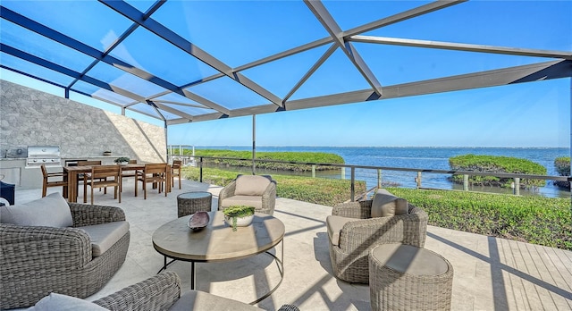 view of patio with a pergola, area for grilling, an outdoor living space, and a water view