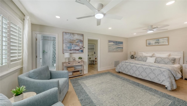 bedroom with ceiling fan and light hardwood / wood-style flooring