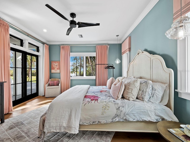 bedroom featuring access to exterior, ceiling fan, french doors, wood-type flooring, and ornamental molding