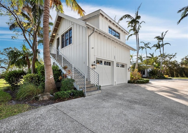 view of side of home featuring a garage