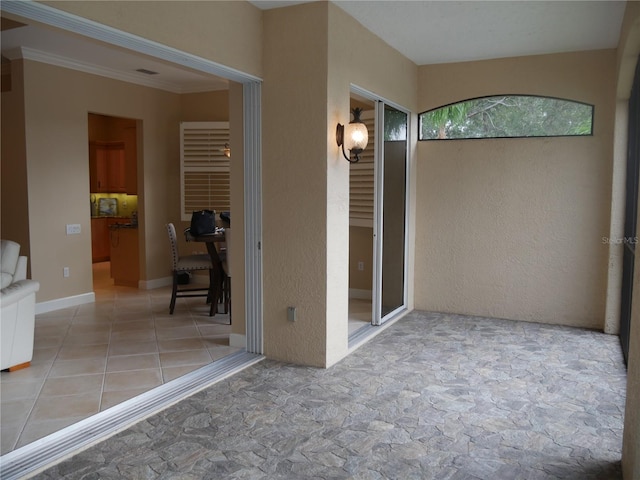 interior space featuring ornamental molding