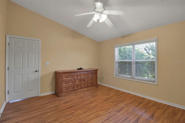 3115 Live Oak Ln Unit 30, Palmetto, FL 34221 - bedroom with lofted ceiling, light wood finished floors, baseboards, and a ceiling fan
