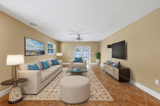 living room with ceiling fan, light tile patterned floors, and french doors