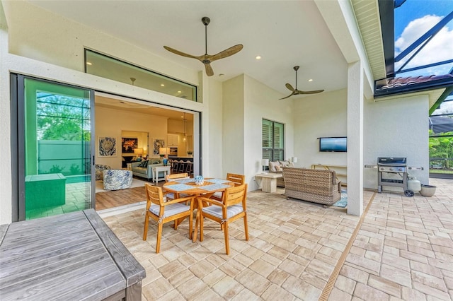 view of patio / terrace with ceiling fan and an outdoor hangout area