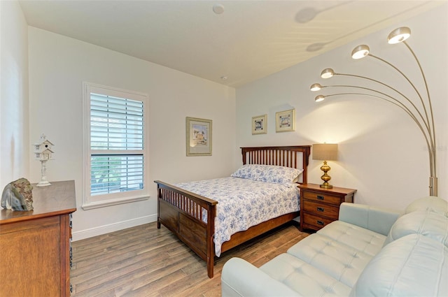 bedroom featuring hardwood / wood-style flooring