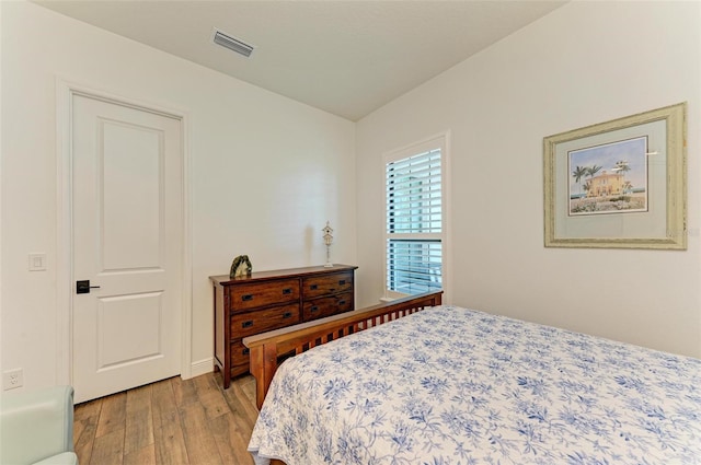 bedroom with light wood-type flooring