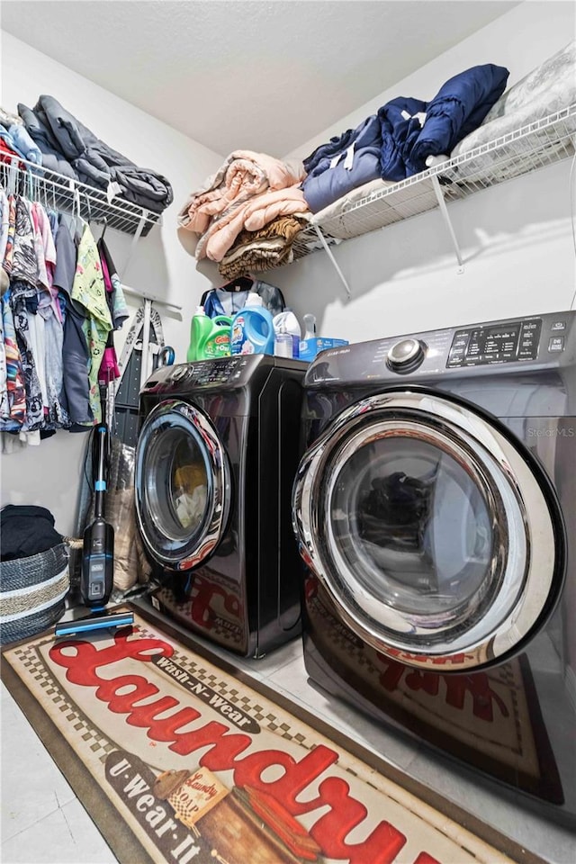 washroom featuring independent washer and dryer