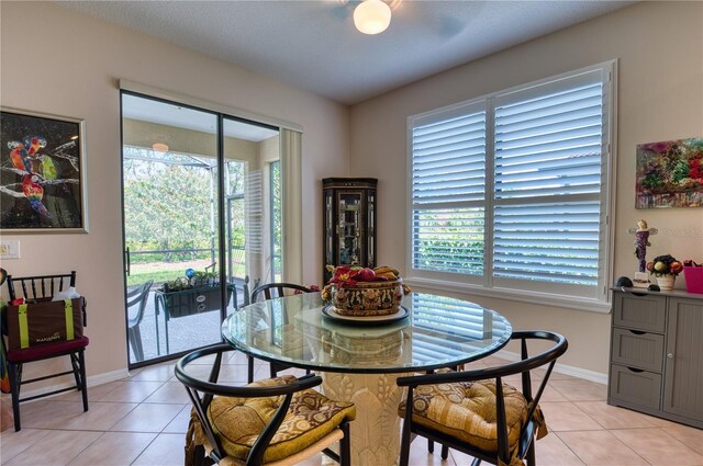 dining room featuring light tile patterned floors