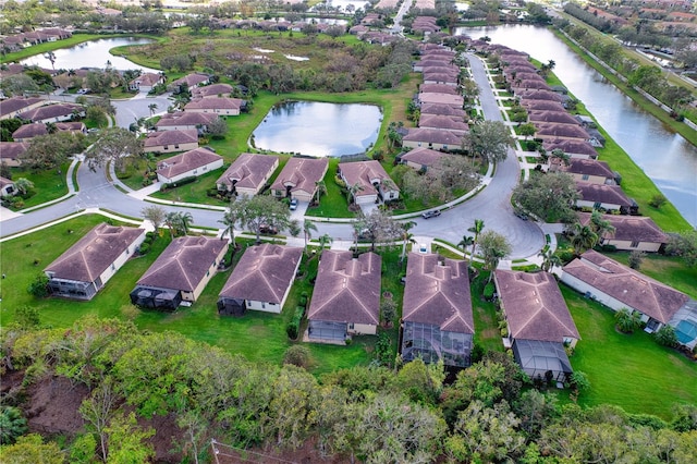 bird's eye view with a water view