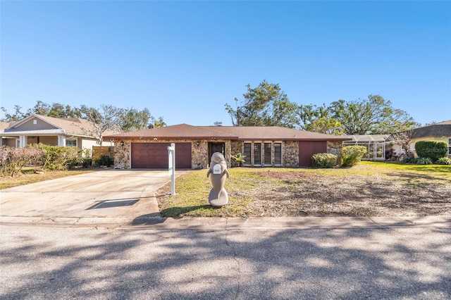 ranch-style house featuring a garage