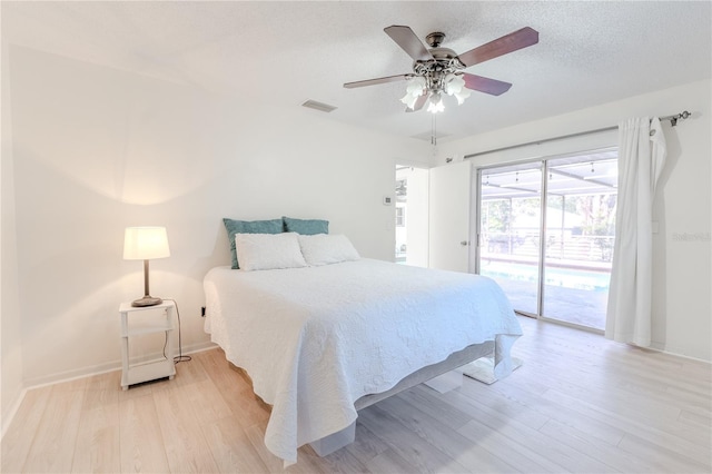 117 Hillcrest Dr, Bradenton, FL 34209 - bedroom with access to outside, light wood-style flooring, a ceiling fan, baseboards, and visible vents