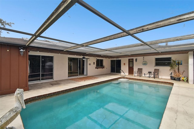 117 Hillcrest Dr, Bradenton, FL 34209 - back of property with a patio, glass enclosure, and an outdoor pool