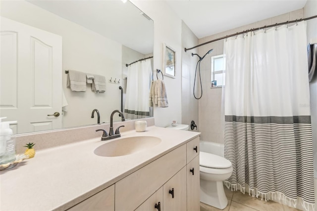 full bathroom with tile patterned flooring, vanity, toilet, and shower / tub combo with curtain