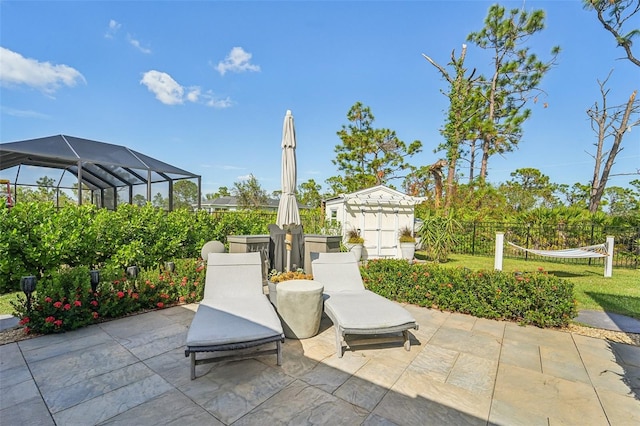 view of patio / terrace featuring a lanai