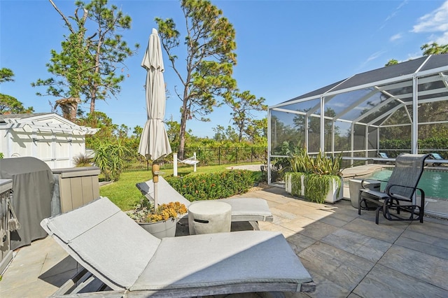 view of patio featuring a fenced in pool and a lanai