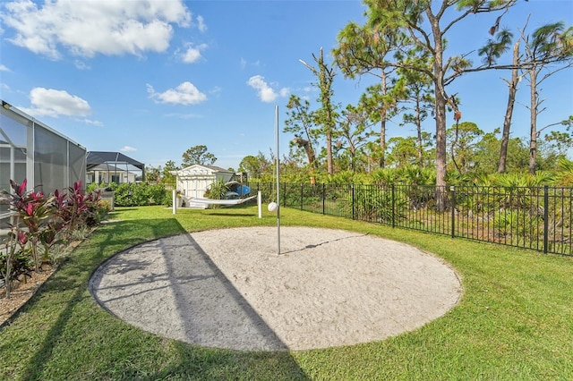 view of property's community with a lawn