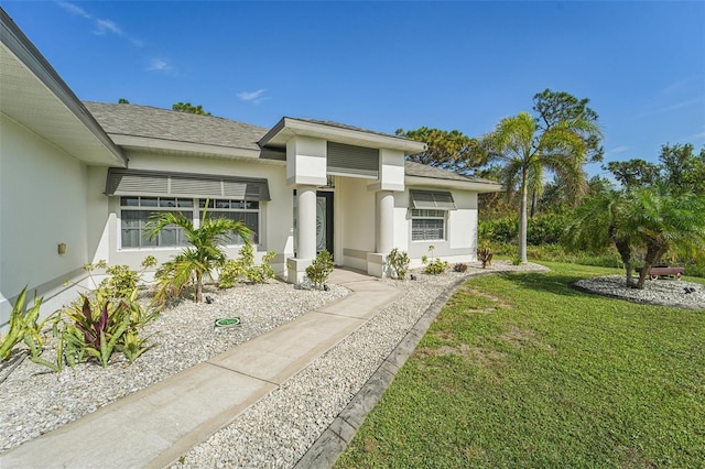 view of front of house with a front yard