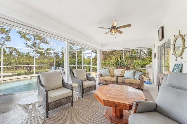 sunroom / solarium with ceiling fan and a healthy amount of sunlight