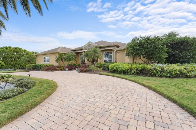 view of front of house with a front lawn