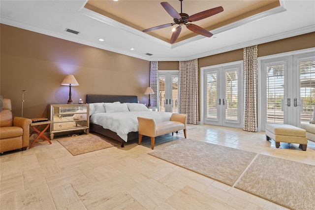 bedroom featuring access to exterior, french doors, and multiple windows