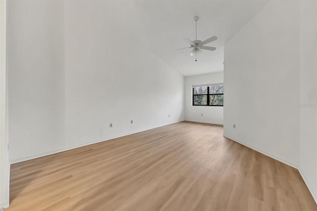 unfurnished living room featuring ceiling fan, high vaulted ceiling, and light hardwood / wood-style floors