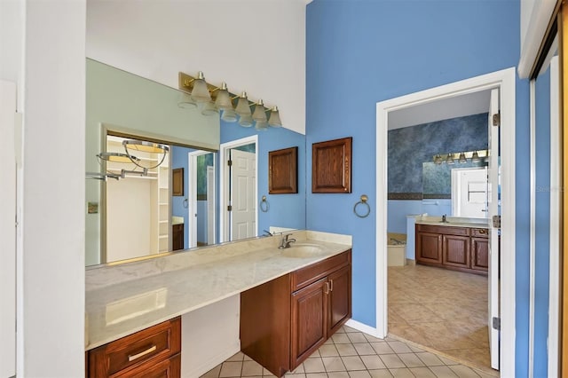 bathroom with vanity and tile patterned flooring