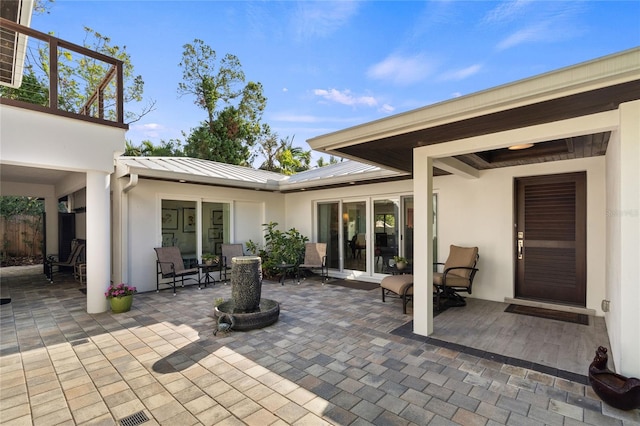 view of patio featuring french doors