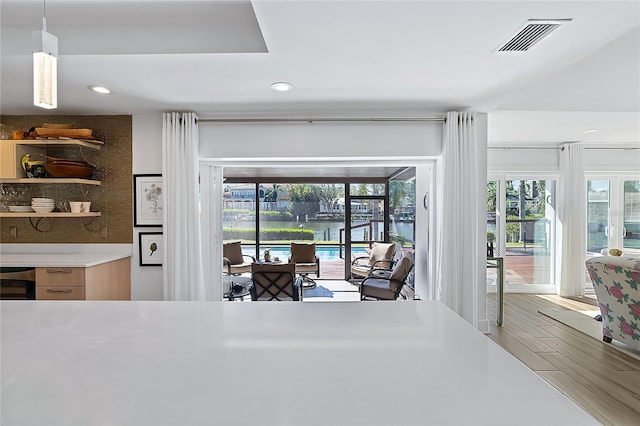 dining area with wood-type flooring