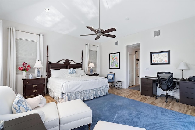 bedroom featuring ceiling fan and light hardwood / wood-style flooring