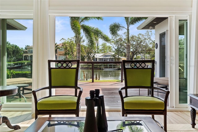 sunroom with a water view